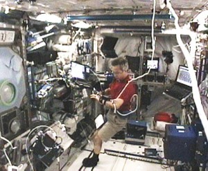 160328main_station_070609 Expedition 20 Flight Engineer Bob Thirsk works with the Integrated Cardiovascular experiment in the International Space Station’s Columbus laboratory. Credit: NASA TV