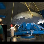 367690main__DSC0074_1_800-600 Engineers study the fully assembled Ares I upper stage hydrogen dome test article. Image credit: NASA/MSFC