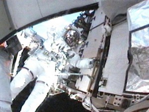 368958main_425x319 Tom Marshburn is seen through Chris Cassidy’s helmet camera as the two work outside the International Space Station during the fourth spacewalk of the STS-127 mission. Photo credit: NASA TV