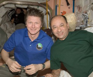 STS-127 Commander Mark Polansky (right) and Expedition 20 Commander Gennady Padalka take a break from a busy agenda onboard the International Space Station. Photo credit: NASA
