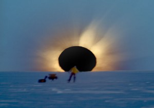 : A totally eclipsed sunrise in Antarctica. Credit and Copyright: Fred Bruenjes of moonglow.net