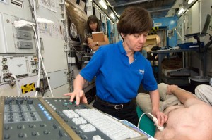 ccoleman Astronaut Cady Coleman performs a remotely guided echocardiogram on a test subject utilizing Integrated Cardiovascular protocols, while Betty Chen, a training coordinator, observes.