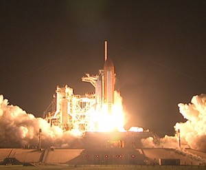 153212main_launch_1_425 Space shuttle Discovery lifts off into the night sky on a mission to the International Space Station. Launch was on-time at 11:59 p.m. EDT. Photo credit: NASA TV