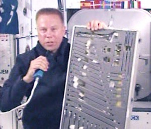 160328main_exp20_kopra_pao_event2 NASA astronaut Tim Kopra shows students in Austin, Texas how tools are stored in microgravity. The event took place at the Bob Bullock Texas State History Museum. Credit: NASA TV