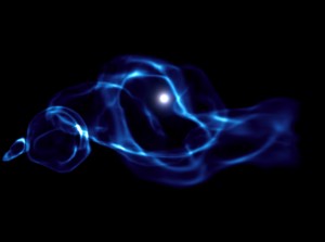377609main_blackhole_diet_HI This frame from the simulation shows the X-rays produced by a black hole (white) and its effects on nearby gas (blue). This scene occurs 400 million years after the universe formed. The black hole, born from a star's collapse 200 million years ago, has grown by less than one percent -- about the mass of our sun -- since.