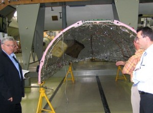 SMOS_fairing048_large,0 Team members viewing the fairing half-shell