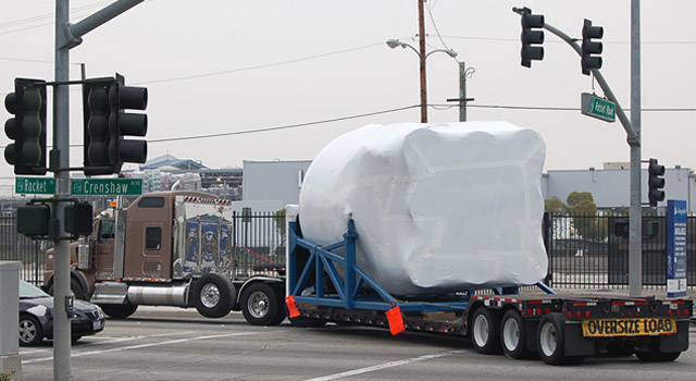 20090922_movetexas The completed Falcon 9 engine structure departs for Texas, where we'll integrate it with the first stage tank, and conduct a test firing before heading to Cape Canaveral for launch.
