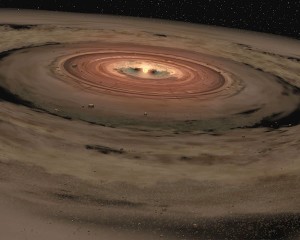 An artist's concept of a protoplanetary disk where young planets are being born. Credit: NASA/JPL-Caltech. This artist’s rendition of 51 Ophiuchi’s inner and outer dust disks illustrates the size difference of their constituent grains. Credit: NASA/JPL-Caltech