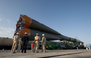 3961495089_f65f2414f3_b Launch pad engineers watch as the Soyuz rocket is rolled onto the launch pad at the Baikonur Cosmodrome in Kazakhstan. Credit: NASA/Bill Ingalls