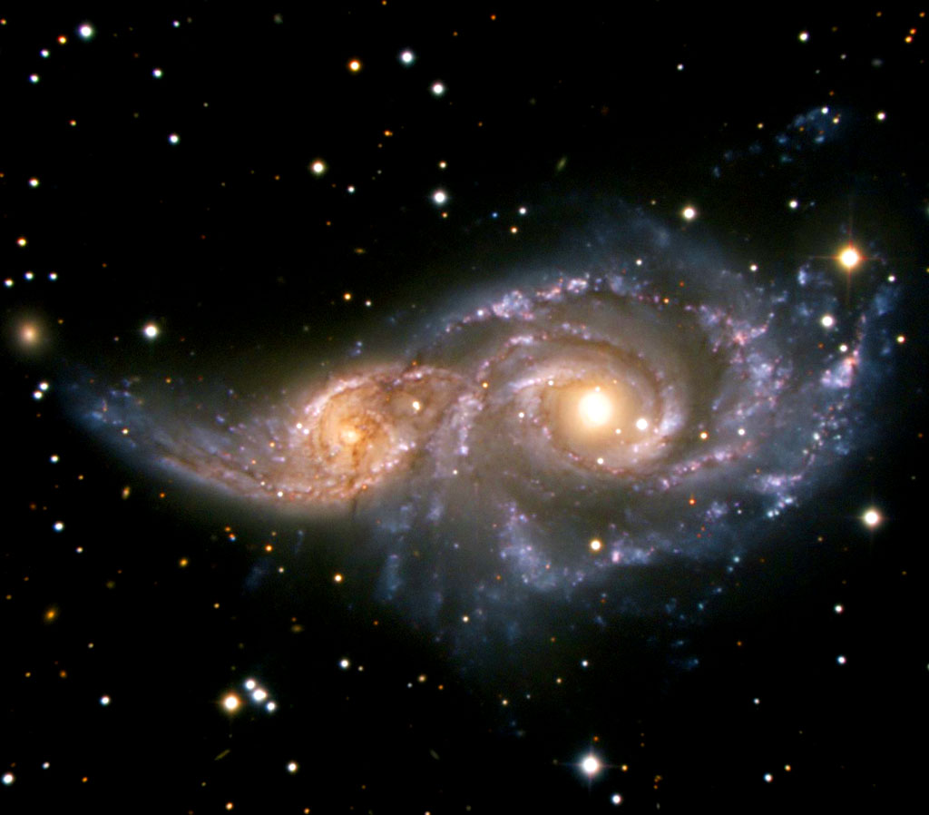 NGC2207_19Apr09_clean_cc1 Canis Major (the Great Dog), NGC 2207 — the larger of the two — and its companion, IC 2163, form a magnificent pair. Credit:ESO