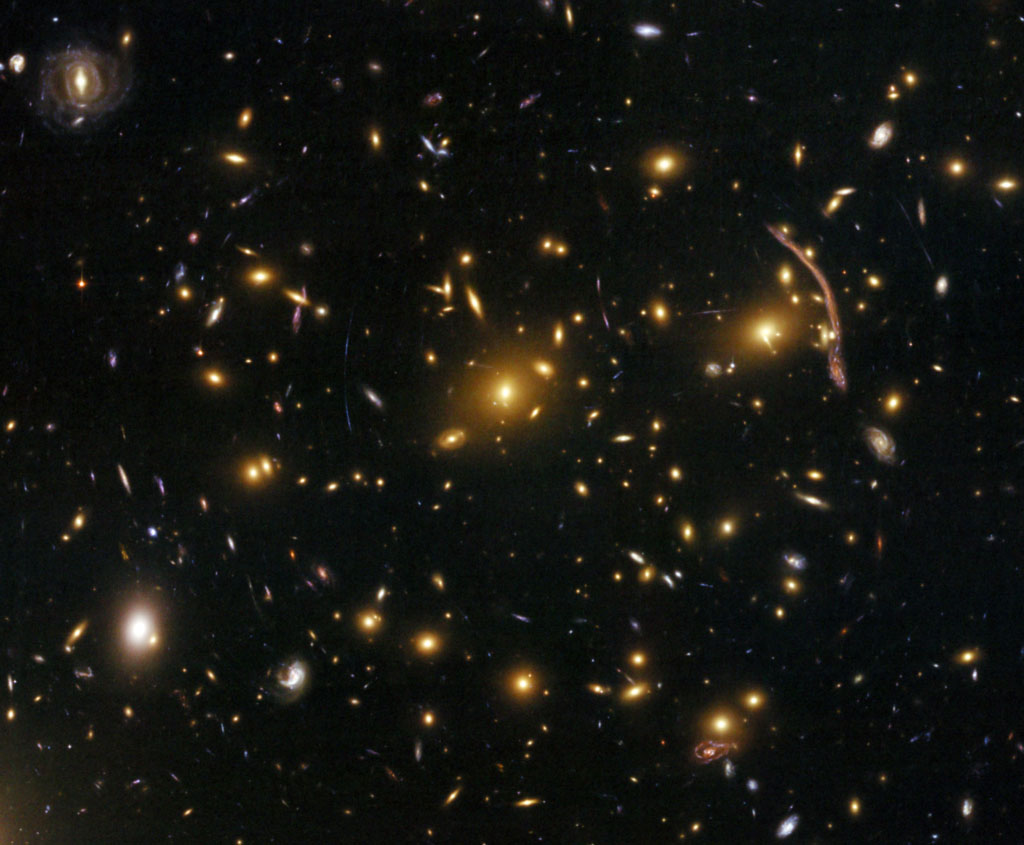 abell370_hst_big Galaxy Cluster Gravitational Lens. Credit: NASA, ESA, and the Hubble SM4 ERO Team