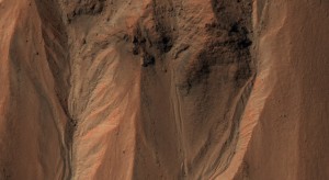 mro20090902-640 This image from the High Resolution Imaging Science Experiment (HiRISE) camera on NASA's Mars Reconnaissance Orbiter shows gullies near the edge of Hale crater on southern Mars. Image Credit: NASA/JPL-Caltech/University of Arizona.
