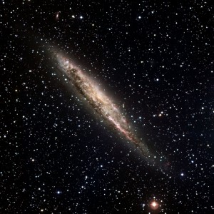 phot-31a-09-fullres Seen edge-on, observations of NGC 4945 suggest that this hive of stars is a spiral galaxy much like our own Milky Way. (Credit:ESO)