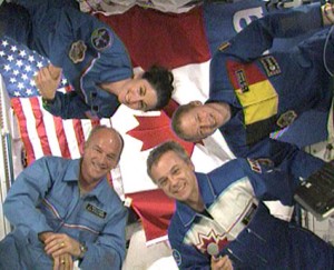 160328main_2009-10-28 Expedition 21 crew members talk with students in Halifax, Nova Scotia. Clockwise from lower right are Flight Engineers Robert Thirsk, Jeff Williams and Nicole Stott and Commander Frank De Winne. Credit: NASA TV