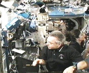 Expedition 21 Flight Engineers Robert Thirsk (left) and Nicole Stott work on the installation of an Active Rack Isolation System rack aboard the International Space Station. Credit: NASA TV Expedition 21 Flight Engineers Robert Thirsk (left) and Nicole Stott work on the installation of an Active Rack Isolation System rack aboard the International Space Station. Credit: NASA TV