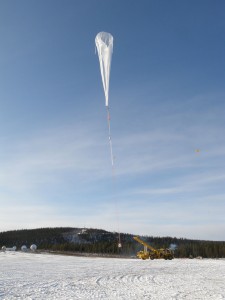 The balloon gains altitude