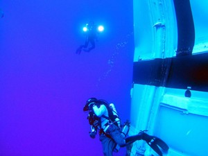 Divers recover the Ares I-X booster. Credit: NASA Divers recover the Ares I-X booster. Credit: NASA