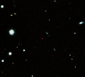 This image shows the afterglow of GRB 090423 (red source in the centre) Credit: A. J. Levan