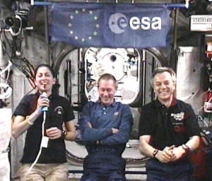160328main_exp21_esa_event Station crew members (from left) Nicole Stott, Frank De Winne and Robert Thirsk talk to Belgian media during a European Space Agency in-flight event. Credit: NASA TV