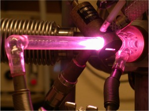 An ice sample is deposited in a chamber, where it is irradiated with high energy UV photons from the hydrogen lamp at approximately - 442 F. The bombarding photons break the chemical bonds in the ice samples, which then form new compounds, such as uracil. An ice sample is deposited in a chamber, where it is irradiated with high energy UV photons from the hydrogen lamp at approximately - 442 F. The bombarding photons break the chemical bonds in the ice samples, which then form new compounds, such as uracil.