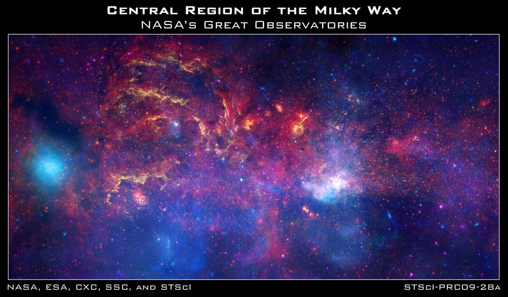 In this spectacular image, observations using infrared light and X-ray light see through the obscuring dust and reveal the intense activity near the galactic core. Note that the center of the galaxy is located within the bright white region to the right of and just below the middle of the image. The entire image width covers about one-half a degree, about the same angular width as the full moon. Credit: NASA, ESA, SSC, CXC, and STScI In this spectacular image, observations using infrared light and X-ray light see through the obscuring dust and reveal the intense activity near the galactic core. Note that the center of the galaxy is located within the bright white region to the right of and just below the middle of the image. The entire image width covers about one-half a degree, about the same angular width as the full moon. Credit: NASA, ESA, SSC, CXC, and STScI