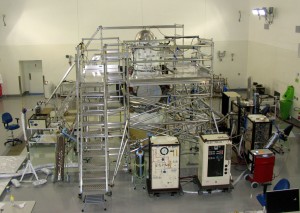 A scaffolding structure built around NASA's Wide-field Infrared Survey Explorer, or WISE, allows engineers to freeze its hydrogen coolant. Credit: NASA/JPL A scaffolding structure built around NASA's Wide-field Infrared Survey Explorer, or WISE, allows engineers to freeze its hydrogen coolant. Credit: NASA/JPL