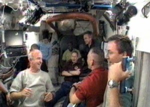 The Expedition 21 crew welcomes the STS-129 crew aboard the International Space Station. Photo credit: NASA TV The Expedition 21 crew welcomes the STS-129 crew aboard the International Space Station. Photo credit: NASA TV
