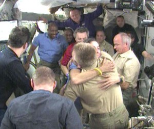 The STS-129 and Expedition 21 crew members bid farewell. Photo credit: NASA TV The STS-129 and Expedition 21 crew members bid farewell. Photo credit: NASA TV