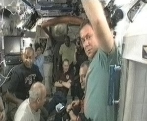 The Expedition 21 crew welcomes the STS-129 crew aboard the International Space Station. Photo credit: NASA TV The Expedition 21 crew welcomes the STS-129 crew aboard the International Space Station. Photo credit: NASA TV