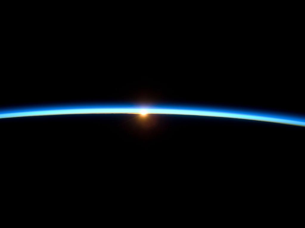 The thin line of Earth's atmosphere and the setting sun. Credit: NASA The thin line of Earth's atmosphere and the setting sun. Credit: NASA