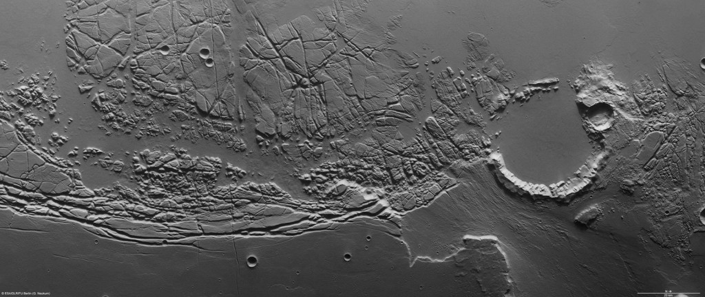 Nadir view of Kasei Valles and Sacra Fossae. North is to the right. Credit: ESA Nadir view of Kasei Valles and Sacra Fossae. North is to the right. Credit: ESA