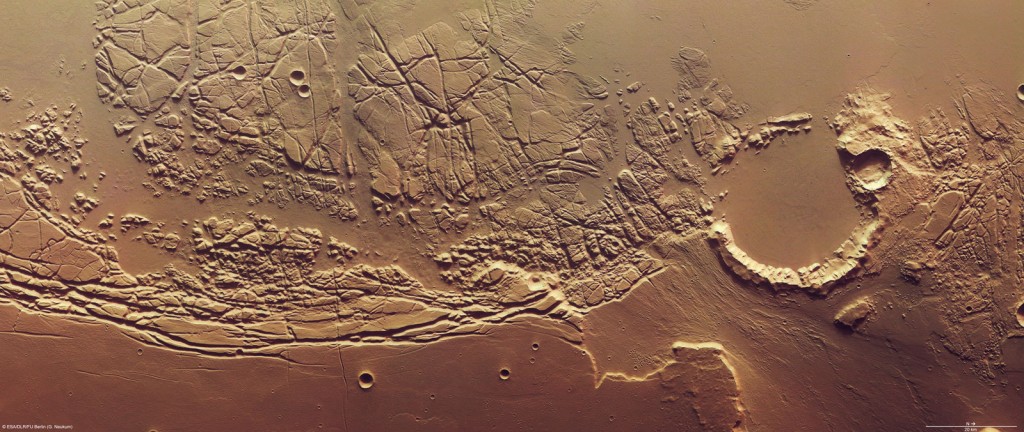 Kasei Valles and Sacra Fossae. North is to the right. Credit: ESA Kasei Valles and Sacra Fossae. North is to the right. Credit: ESA