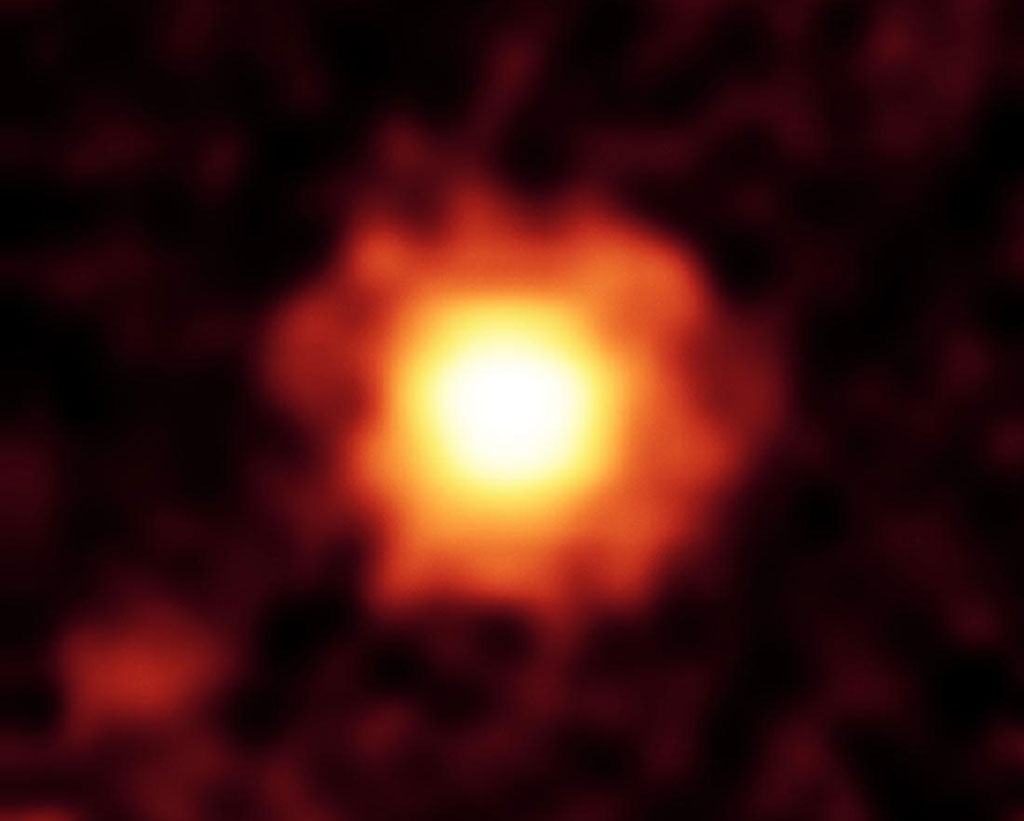 NASA's Spitzer Space Telescope captured this infrared image of a giant halo of very fine dust around the young star HR 8799. Credit: NASA/JPL-Caltech/Univ. of Ariz. NASA's Spitzer Space Telescope captured this infrared image of a giant halo of very fine dust around the young star HR 8799. Credit: NASA/JPL-Caltech/Univ. of Ariz.