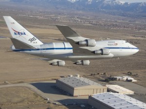 NASA's SOFIA infrared observatory 747SP overflies its home, the Dryden Aircraft Operations Facility in Palmdale, Calif. Credit: NASA/Jim Ross. NASA's SOFIA infrared observatory 747SP overflies its home, the Dryden Aircraft Operations Facility in Palmdale, Calif. Credit: NASA/Jim Ross.