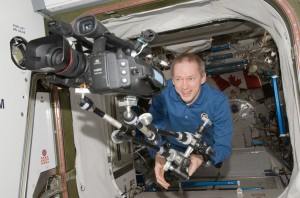 Expedition 21 Commander Frank De Winne moves a High Definition Video (HDV) camera and equipment from the Kibo laboratory into the Harmony node of the International Space Station. Credit: NASA Expedition 21 Commander Frank De Winne moves a High Definition Video (HDV) camera and equipment from the Kibo laboratory into the Harmony node of the International Space Station. Credit: NASA