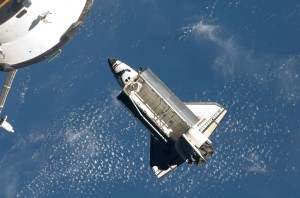 Space shuttle Atlantis flies around the International Space Station after undocking. Photo credit: NASA Space shuttle Atlantis flies around the International Space Station after undocking. Photo credit: NASA