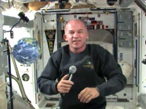 160328main_121509-19 Expedition 22 Commander Jeff Williams talks with students at the New England Air Museum in Windsor Locks, Conn. Credit: NASA TV