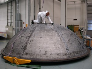 The spherical tank dome was manufactured from a flat plate "blank" made of the 2195 alloy. The blank was constructed by friction stir welding together two commercial off-the-shelf plates in order to produce a large starting blank. Credit: MT Aerospace The spherical tank dome was manufactured from a flat plate "blank" made of the 2195 alloy. The blank was constructed by friction stir welding together two commercial off-the-shelf plates in order to produce a large starting blank. The welded plate blank was then spun formed to create the single-piece tank dome. (MT Aerospace)