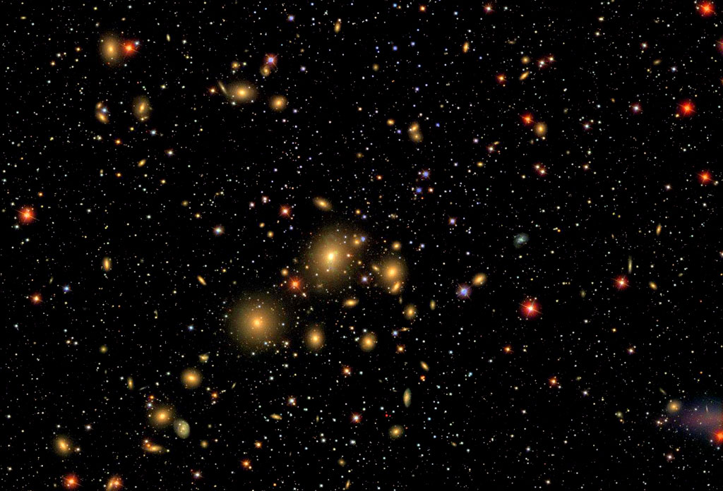 The Perseus galaxy cluster contains 190 galaxies and lies about 225 million light-years away. Credit: Robert Lupton and the Sloan Digital Sky Survey Consortium The Perseus galaxy cluster contains 190 galaxies and lies about 225 million light-years away. Credit: Robert Lupton and the Sloan Digital Sky Survey Consortium