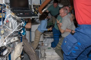 STS-129 and Expedition 21 crew members greet each other shortly after space shuttle Atlantis and the International Space Station docked in space and the hatches were opened. Credit: NASA STS-129 and Expedition 21 crew members greet each other shortly after space shuttle Atlantis and the International Space Station docked in space and the hatches were opened. Credit: NASA