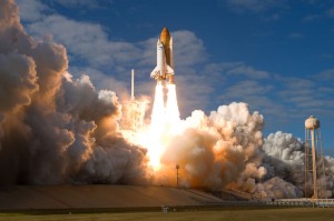 Space shuttle Atlantis lifts off from the exhaust cloud building on Launch Pad 39A at NASA's Kennedy Space Center in Florida. Credit: NASA Space shuttle Atlantis lifts off from the exhaust cloud building on Launch Pad 39A at NASA's Kennedy Space Center in Florida. Credit: NASA