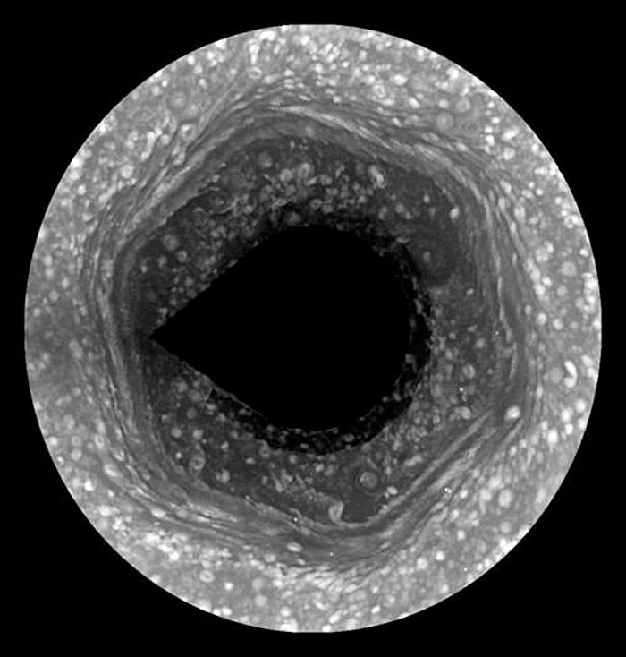 Saturn's Mysterious Hexagon Emerges from Winter Darkness. Credit: NASA Saturn's Mysterious Hexagon Emerges from Winter Darkness. Credit: NASA