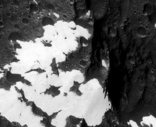 Cassini zooms in, for the first time, on the patchy, bright and dark mountains on Saturn's two-toned moon, Iapetus. Credits: NASA/ JPL Cassini zooms in, for the first time, on the patchy, bright and dark mountains on Saturn's two-toned moon, Iapetus. Credits: NASA/ JPL