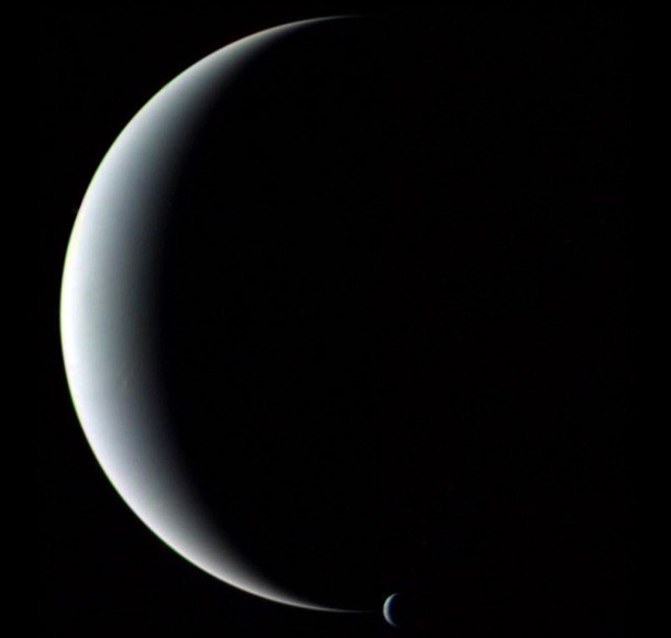 Crescent Neptune and Triton by the Voyager 2 spacecraft. Credit: NASA Crescent Neptune and Triton by the Voyager 2 spacecraft. Credit: NASA