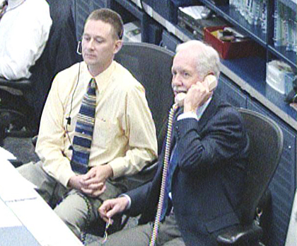 Seated next to Spacecraft Communicator Jay Marschke, Captain Chesley B. "Sully" Sullenberger (right) speaks with the International Space Station’s Expedition 22 crew while visiting the Mission Control Center at Johnson Space Center in Houston. Credit: NASA Seated next to Spacecraft Communicator Jay Marschke, Captain Chesley B. "Sully" Sullenberger (right) speaks with the International Space Station’s Expedition 22 crew while visiting the Mission Control Center at Johnson Space Center in Houston. Credit: NASA