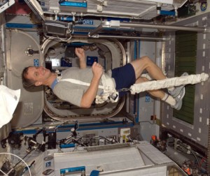 Flight Engineer T.J. Creamer, equipped with a bungee harness, exercises on the Combined Operational Load Bearing External Resistance Treadmill (COLBERT) in the Harmony node of the International Space Station. Credit: NASA Flight Engineer T.J. Creamer, equipped with a bungee harness, exercises on the Combined Operational Load Bearing External Resistance Treadmill (COLBERT) in the Harmony node of the International Space Station. Credit: NASA