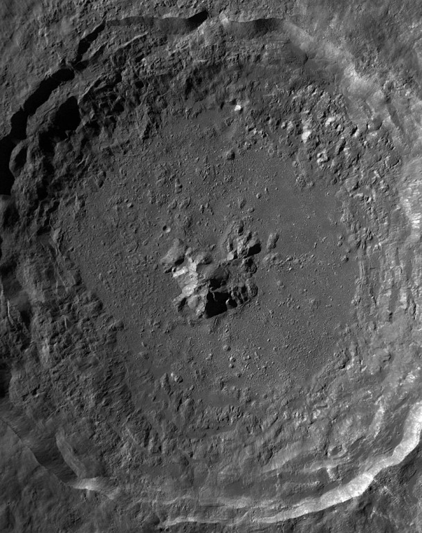 Rock melted by the Tycho impact event flowed across the floor of the newly-formed crater in the direction indicated by arrows before it solidified into a rock made up of a mixture of minerals and glass. Resolution is reduced by a factor of two. Credit: NASA Rock melted by the Tycho impact event flowed across the floor of the newly-formed crater in the direction indicated by arrows before it solidified into a rock made up of a mixture of minerals and glass. Resolution is reduced by a factor of two. Credit: NASA