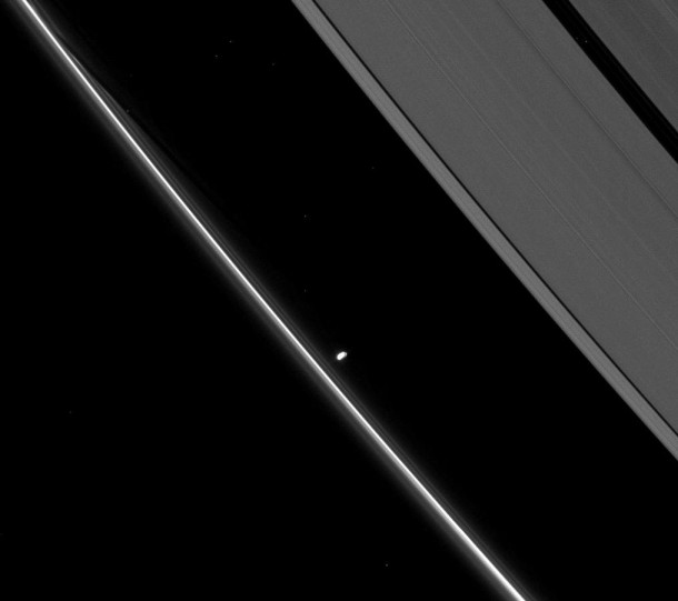 Saturn's small moon Prometheus, slightly overexposed in this image, shows off its potato-like shape. Credit: NASA Saturn's small moon Prometheus, slightly overexposed in this image, shows off its potato-like shape. Credit: NASA