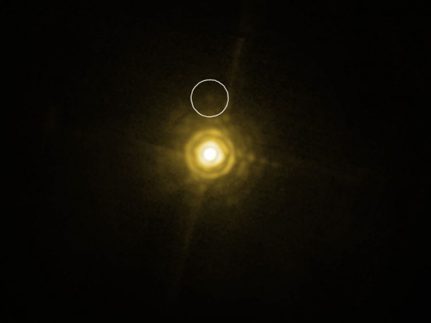 The bright and very young star HR 8799, about 130 light-years away from Earth, hosts a planetary system that looks like a scaled-up model of our own Solar System. Credit: ESO The bright and very young star HR 8799, about 130 light-years away from Earth, hosts a planetary system that looks like a scaled-up model of our own Solar System. Credit: ESO