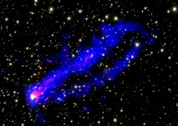 Two spectacular tails of X-ray emission can be seen trailing behind a galaxy using the Chandra X-ray Observatory in this image. Credit: NASA Two spectacular tails of X-ray emission can be seen trailing behind a galaxy using the Chandra X-ray Observatory in this image. Credit: NASA